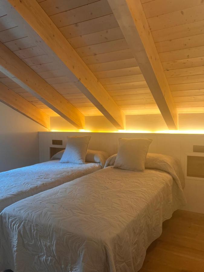Apartamentos Turisticos: Tu Casa En Sahun Exterior photo